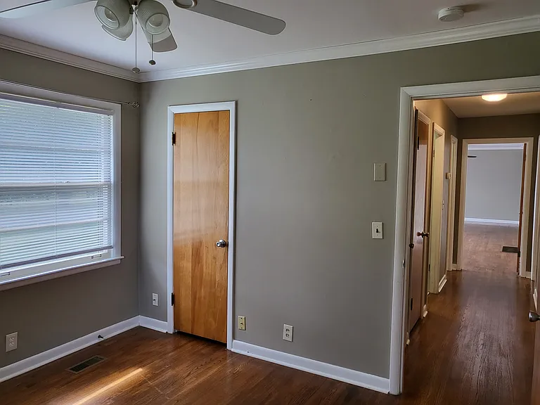 Front corner bedroom with hall access.