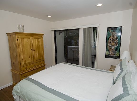 Guest room with attached bathroom and deck