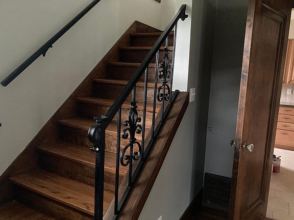 Steps to second level which contain 3 bedrooms and full bathroom.