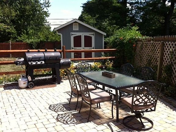 Another view of yard looking toward storage shed