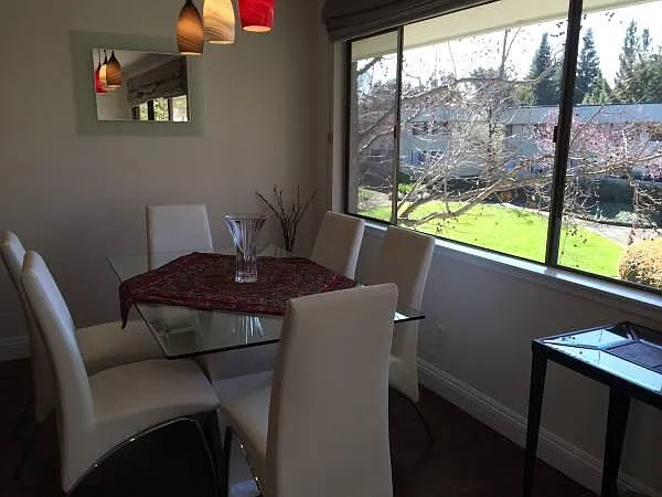 separate dining area boasting an abundance of natural light.