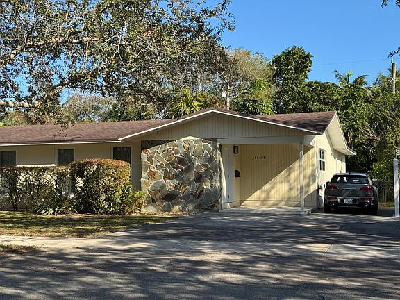Front of home with completely private entrance and off-street, paved parking for 3 cars.