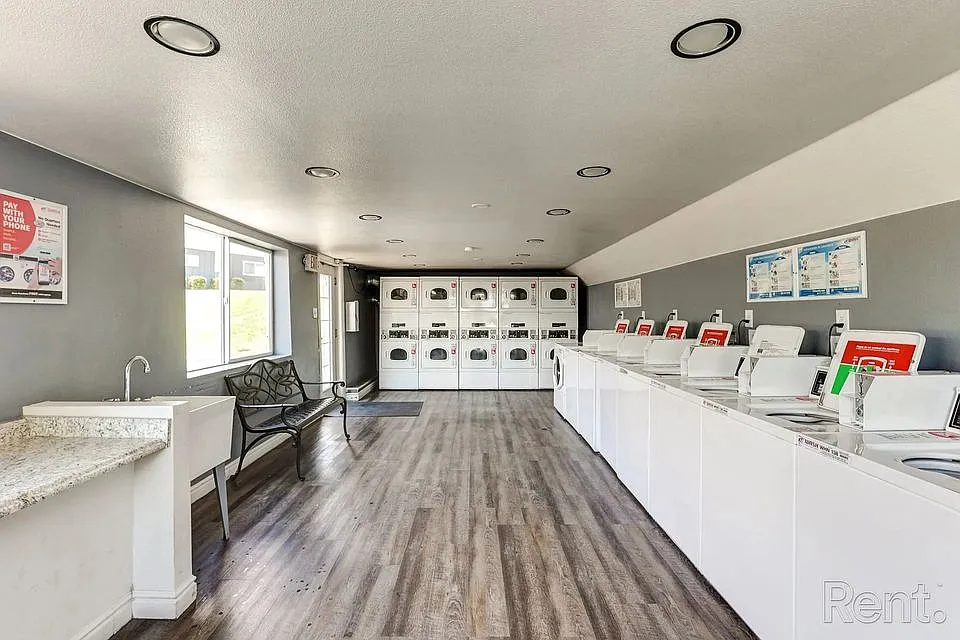 On-site Laundry Facility - Sunset Ridge Apartments