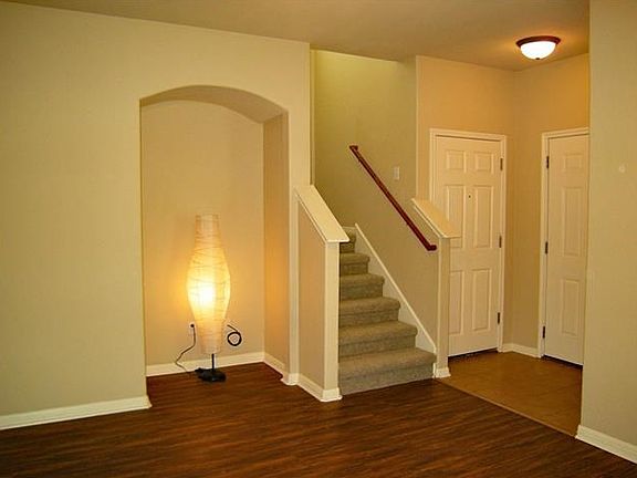 The door to the right is the front door, the other door is the door to the garage.