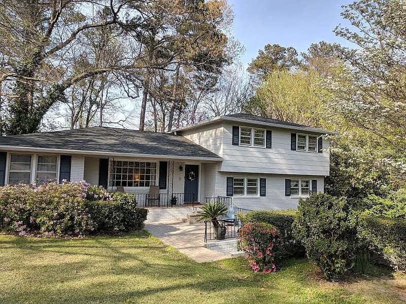 Large front lawn and patio.