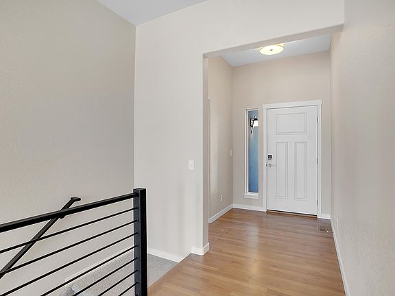 Welcoming entry. Photo representing home to be built and may demonstrate optional features