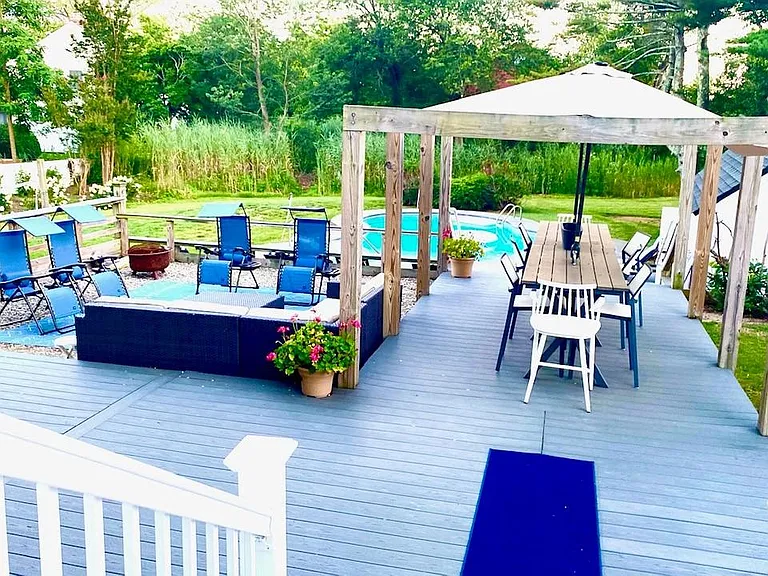 Dining, lounge area, to the left is also a grill area and outdoor shower