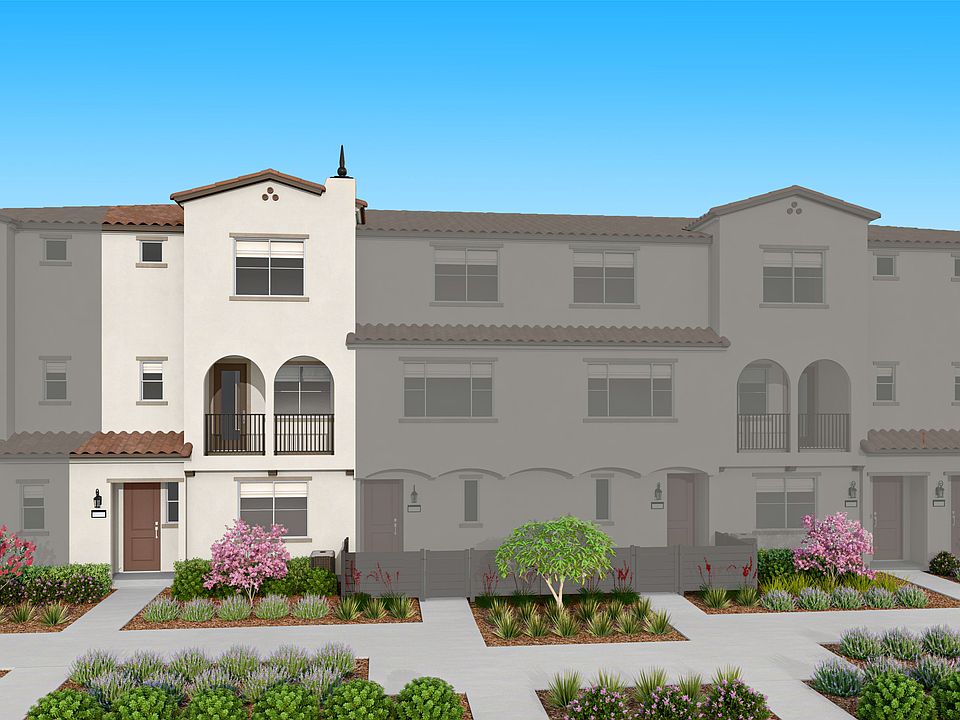 The image depicts a multi-story residential building with a Mediterranean-style architecture, surrou