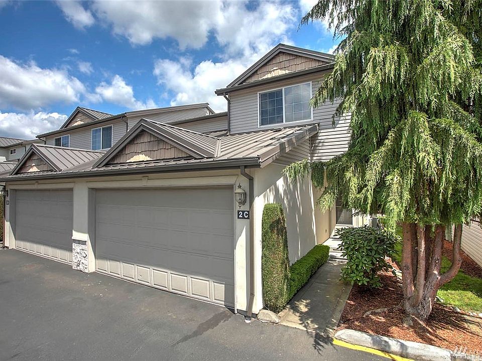 Welcome home to Meadow Valley Condominiums! Delight in this 2 bedroom, 3 bathroom townhome-style condo. This popular, open-concept floor plan unites the kitchen with the living and dining areas, affording you great opportunities to connect with guests. The living room offers a welcoming gas fireplace. A large slider leads to a sunny, secluded covered patio and landscaped garden space. Upstairs you'll find two large bedrooms, both with walk-in closets. The master also has a huge ensuite bath with dual vanities. This unit has an attached 2-car garage. Enjoy all the benefits of home ownership with the convenience of the condo lifestyle. Meadow Valley is a gated community and truly a commuter's dream location, nestled in the heart of Auburn with convenient access to rapid transit, dining, retail and business hubs.