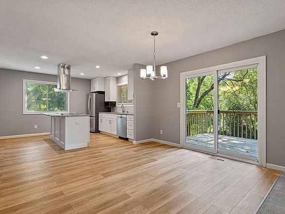 Dining area with doors to deck