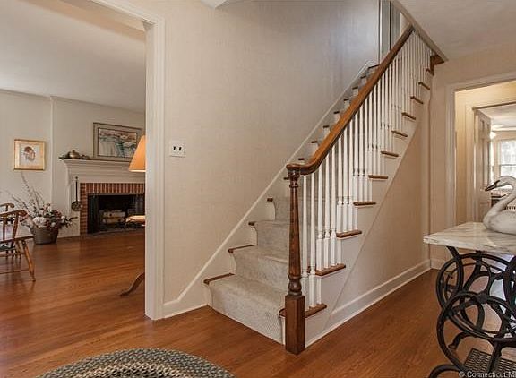 Center hall colonial with hardwood and gracious foyer.