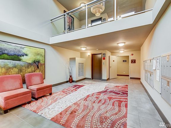 Serene grounds with waterfalls, green areas and more.