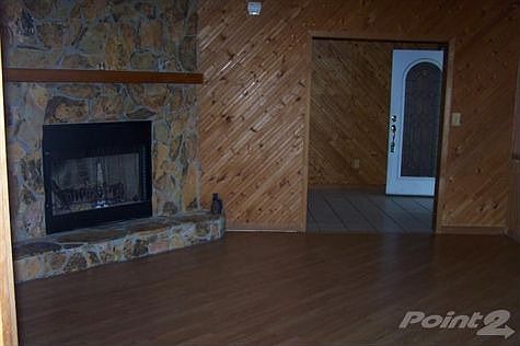 Formal living room 16 x 17w/ wood burn fire place