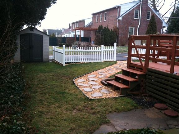 Fenced in yard - private,with deck and stoned walk