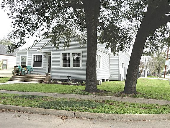 There's no place like home - corner lot - mature trees - vinyl siding - decorative wrought iron fencing - a world of charm.
