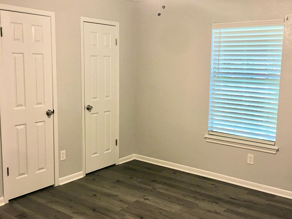 Large bedroom with his and her closets.