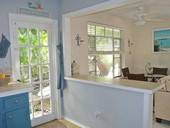 Old kitchen into dining area (Totally new cabinets , bar and countertops being completed this week.