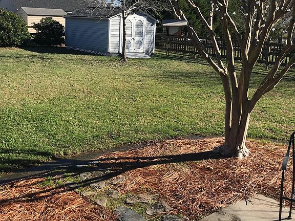 Large shed in backyard.