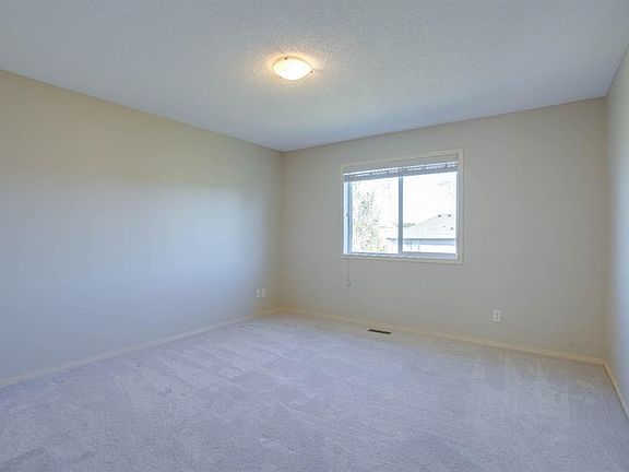 3rd image of 15 S Tuscany Reserve Bay NW