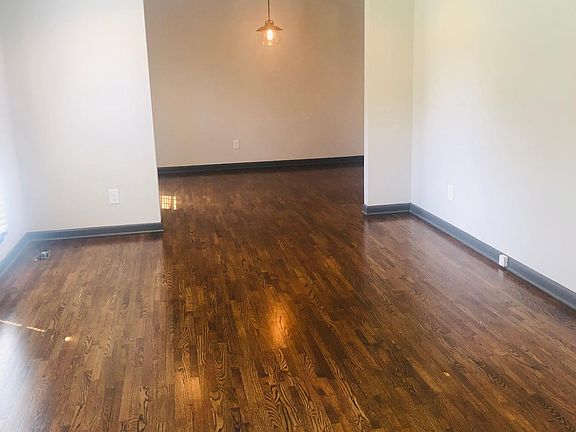 formal living room located adjacent to dining room