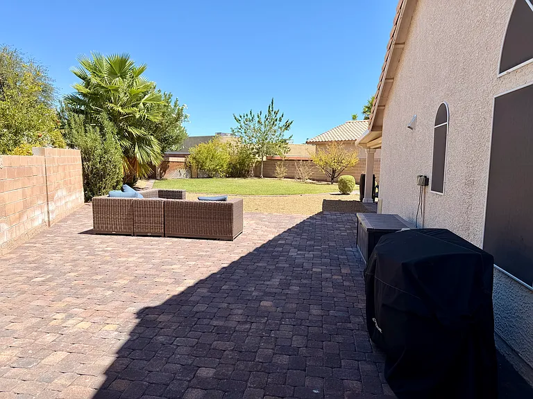 Side patio looking into backyard.