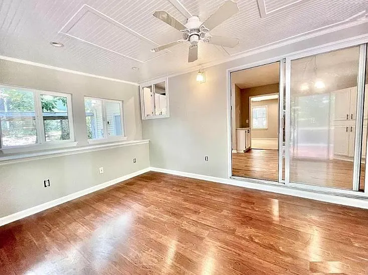 sunroom area leading to kitchen