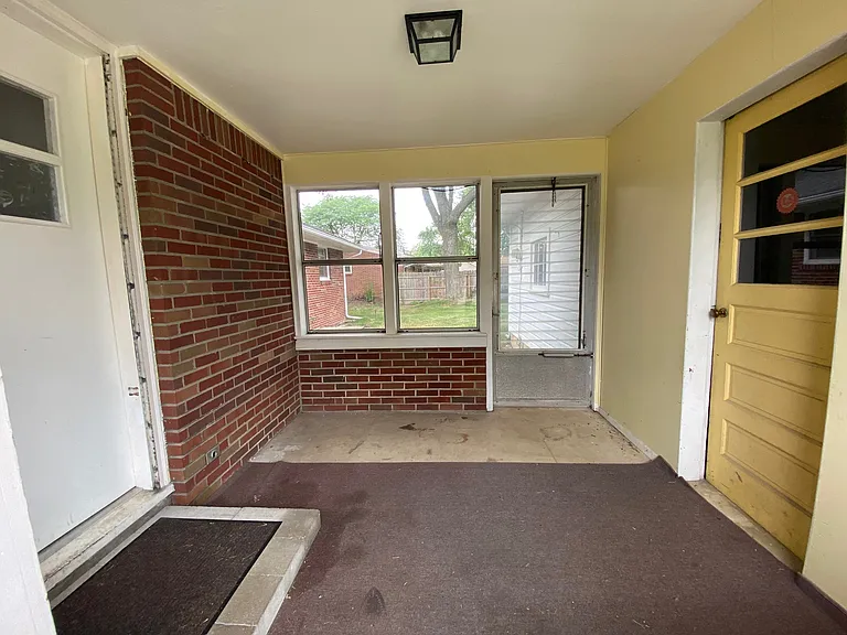 Doors to the house, backyard, and garage