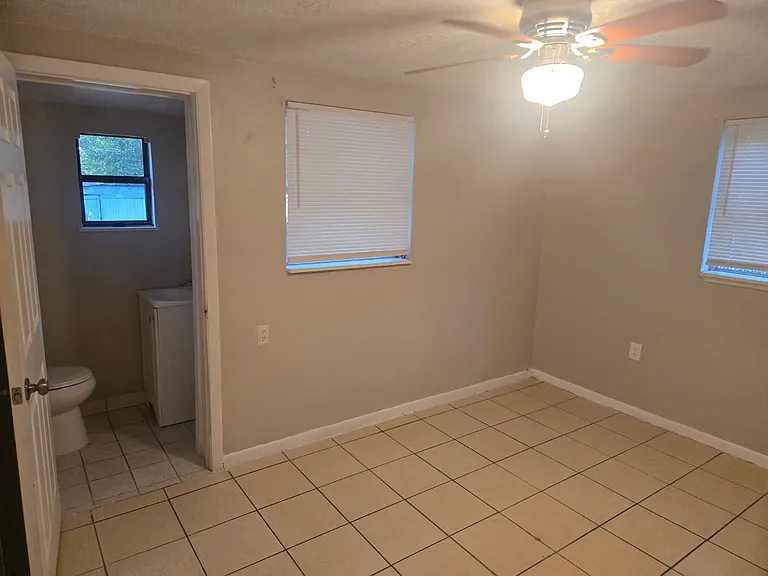 Bedroom 1 with half bath