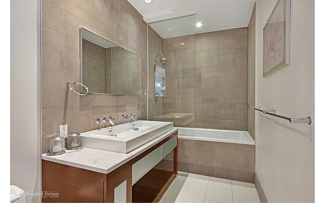 Sold by Douglas Elliman | media 11