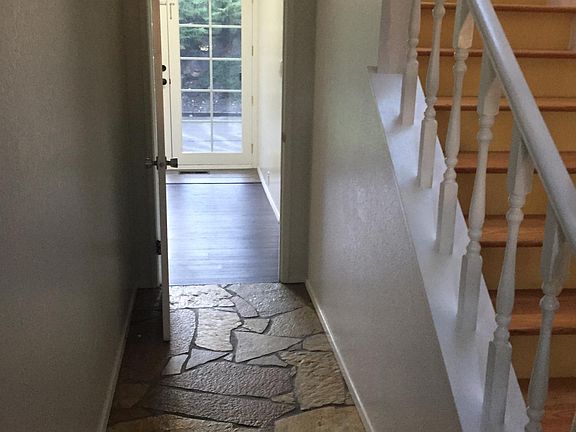 Entry from front door, looking back toward kitchen and double doors to back yard