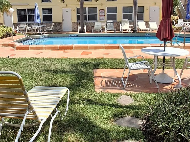 enjoy poolside access directly from you bedroom