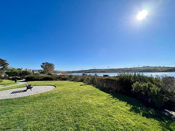 This view of the lagoon never gets old. And yes, that is "Dog Beach" over the hedge. We are dog lovers and will consider smaller breeds that are well behaved and potty trained.