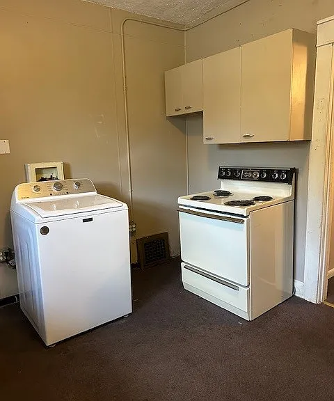 Upper level washer and kitchen