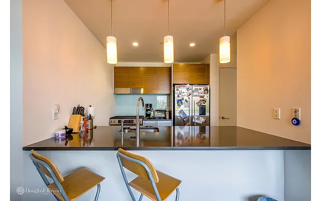 Rented by Douglas Elliman | media 12