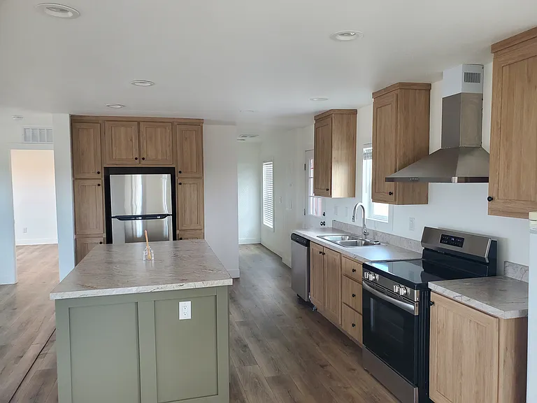 KITCHEN TO LAUNDRY ROOM ON RIGHT SIDE