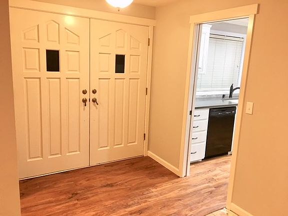 Fantastic open entry way with double doors.  Old-school, wal
