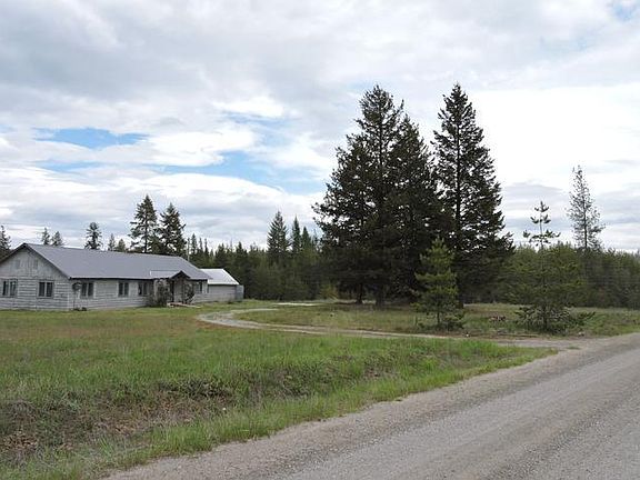 DISTANT VIEW OF SUBJECT FROM COUNTY ROAD FRONTING