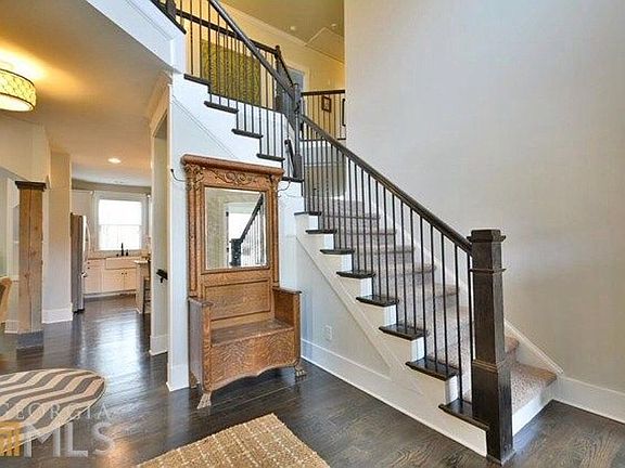 Foyer with split staircase
