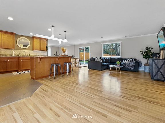 View from the front room into the living and kitchen space.