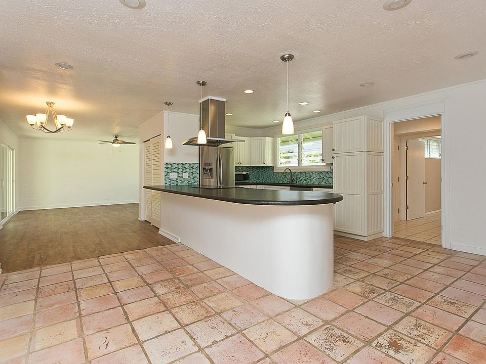 kitchen (to be remodeled) towards living room, on right side door to guest suite