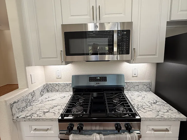 Kitchen stove/oven and counter.
