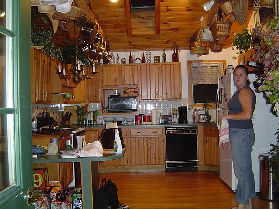 Kitchen w/ cathedral ceilings & exposed beams
