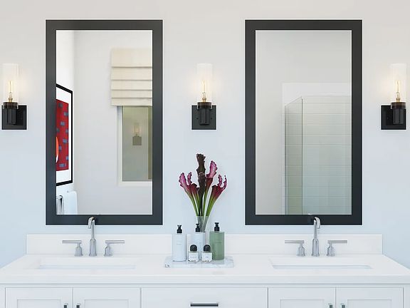 Primary bath with matte black mirrors and dual sinks