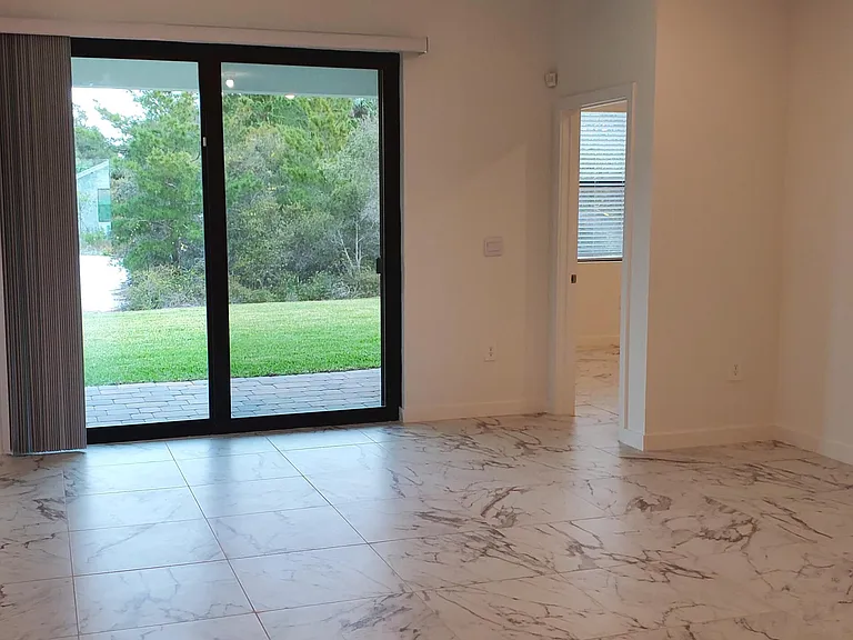 1949 NE Ocean Dunes Dr — Photo 17