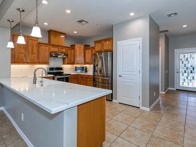 Open kitchen / stainless steel appliances/ Induction Stove with Power Boost.