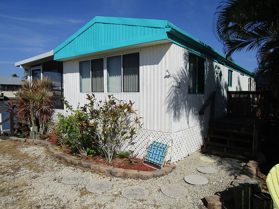 1st image of 4500 Pine Island Rd NW Lot 13