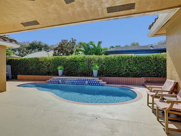 4142 NW 58th Dr — Photo 56