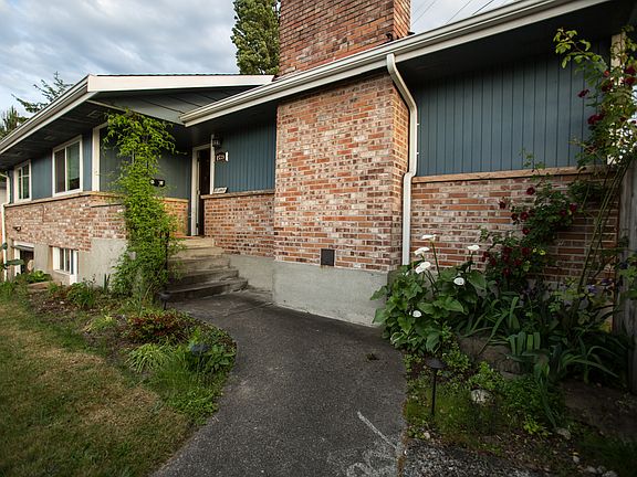 Private front door entrance with gate to the backyard.