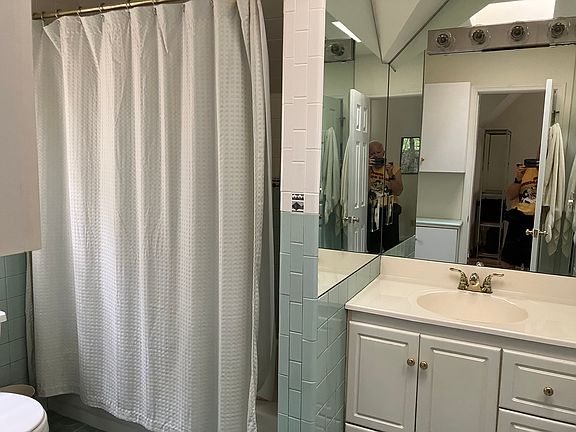 includes tub and shower