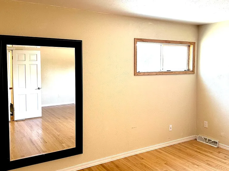MBR suite, back wall. bathroom and closet are on the left